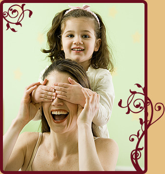 photo of daughter covering mother's eyes